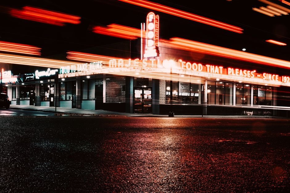 Abstract night shot of Majestic Diner with vibrant light trails in Atlanta.