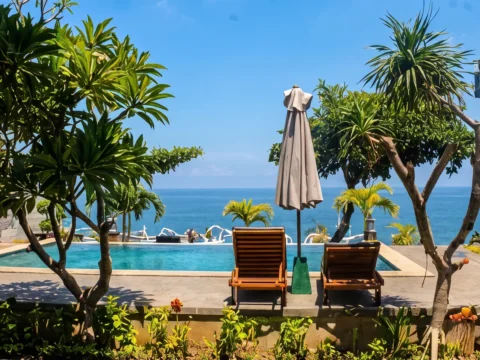 Alam Bali Beach Resort seen from the pool and beachfront