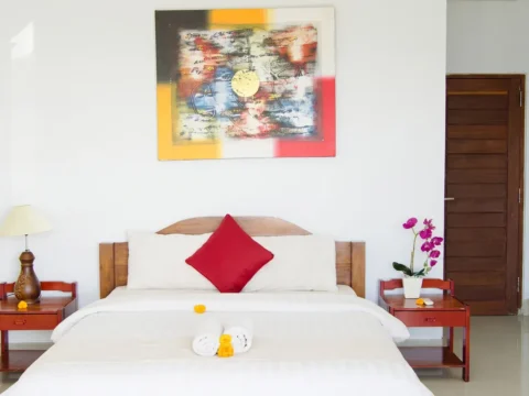 Guest room with balcony at Alam Bali Beach Resort in Amed